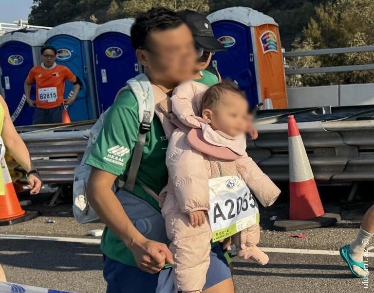 Marafonda körpə ilə qaçan çinli kişi barədə cinayət işi açıldı